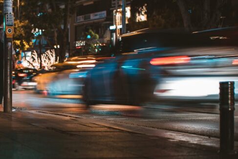 cars speeding by at night